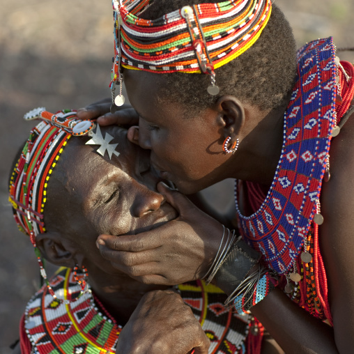 El molo tribe women cleaning their eyes from dust, Rift Valley Province, Turkana lake, Kenya