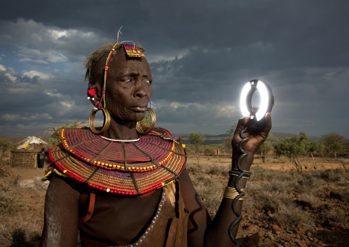 Portrait of a Pokot tribe woman with huge necklaces and earrings, Baringo County, Baringo, Kenya