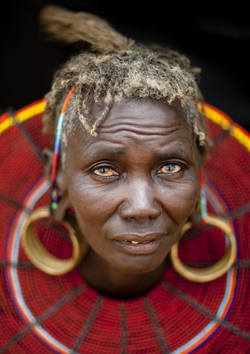 Portrait of a Pokot tribe woman with huge necklaces and earrings, Baringo County, Baringo, Kenya