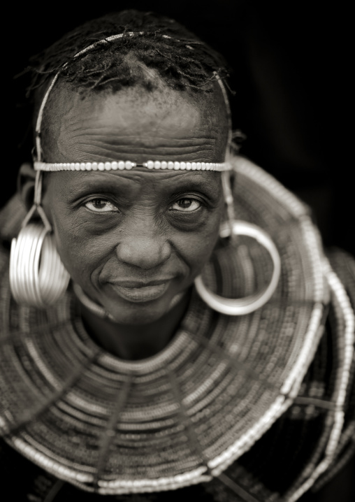 Portrait of a Pokot tribe woman with huge necklaces and earrings, Baringo County, Baringo, Kenya
