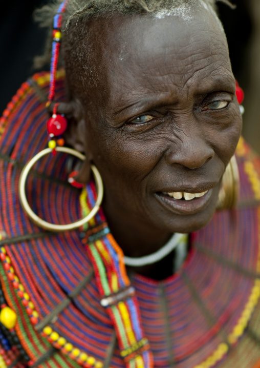Portrait of a Pokot tribe woman with huge necklaces and earrings, Baringo County, Baringo, Kenya