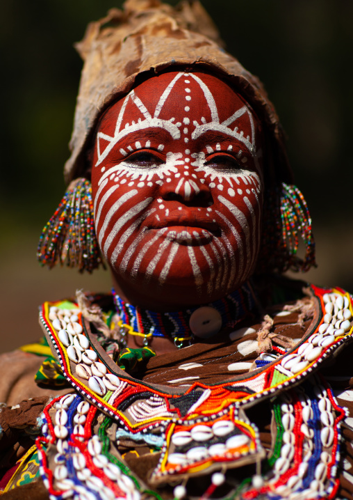 Kikuyu tribe woman with traditional make up, Laikipia County, Thomson waterfalls, Kenya