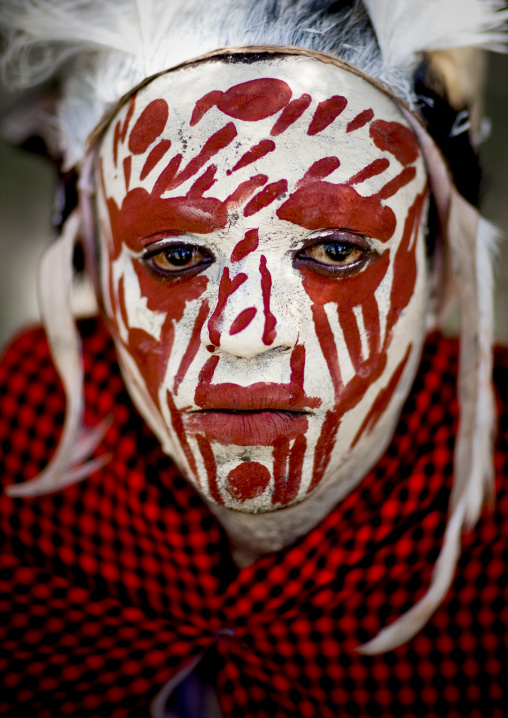 Portrait of a Kikuyu tribe warrior with traditional make up, Laikipia County, Thomson waterfalls, Kenya