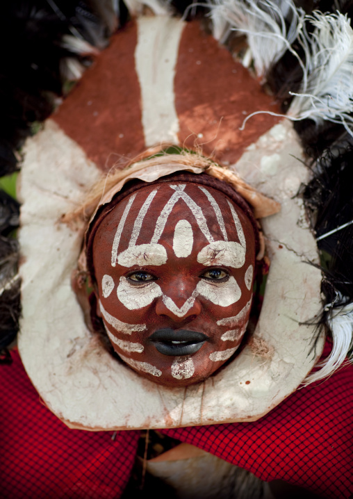 Portrait of a Kikuyu tribe warrior with traditional make up, Laikipia County, Thomson waterfalls, Kenya