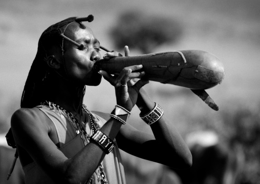 Maasai warrior drinking cow blood in a calabash, Nakuru county, Nakuru, Kenya
