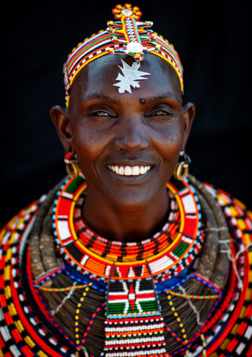 Portrait of a smiling Samburu tribe woman with beaded necklaces, Samburu County, Maralal, Kenya