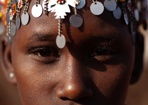 Portait of a young Rendille tribe girl with a silver headwear, Marsabit County, Marsabit, Kenya