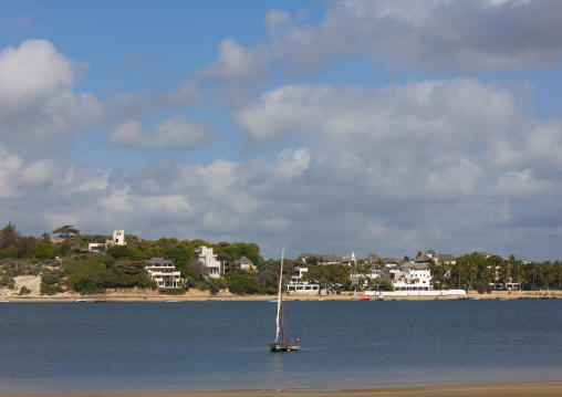A dhow in the channel seen from Manda island, Lamu County, Lamu, Kenya