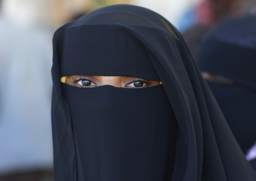 Young muslim woman wearing burqa, Lamu county, Lamu, Kenya