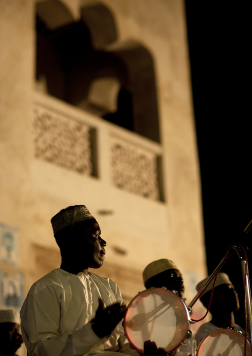 Musicians on stage playing during Maulid festival, Lamu County, Lamu, Kenya