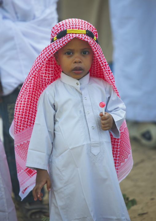 Young muslim boy during Maulid festival, Lamu County, Lamu, Kenya