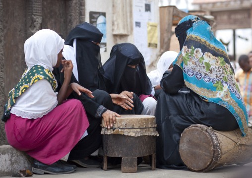 Muslim women and children in the street, Lamu County, Lamu, Kenya