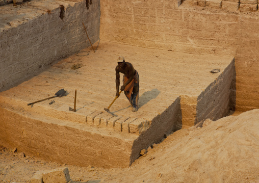 Man working in a coral stone quarry, Lamu County, Lamu, Kenya