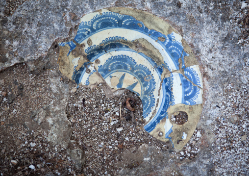 Old chinese plate on a grave in Takwa ruins, Lamu County, Lamu, Kenya
