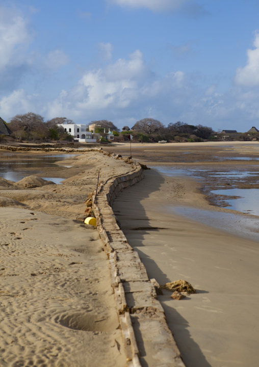 Beach erosion along the seashore at low tide, Lamu County, Lamu, Kenya