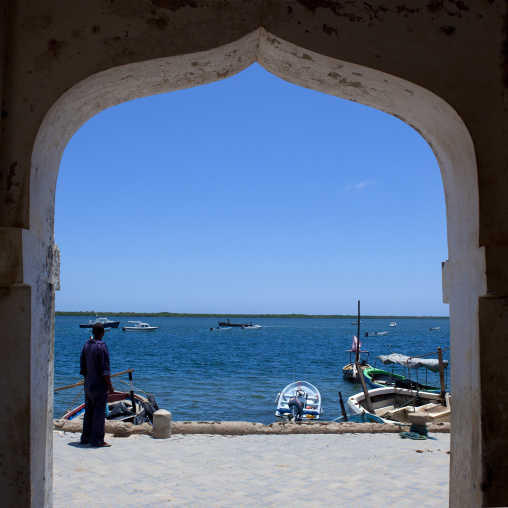 Sea view from an arch doorway on the port, Lamu County, Lamu, Kenya