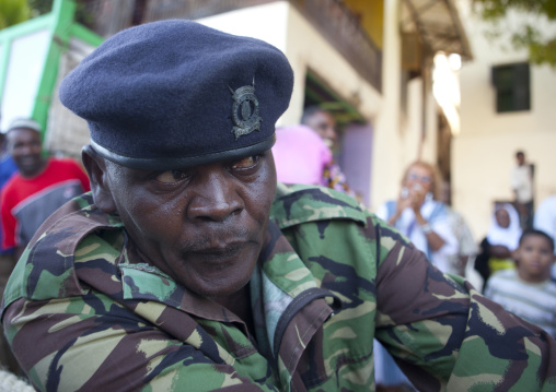Policeman playing rope game, Lamu County, Lamu, Kenya