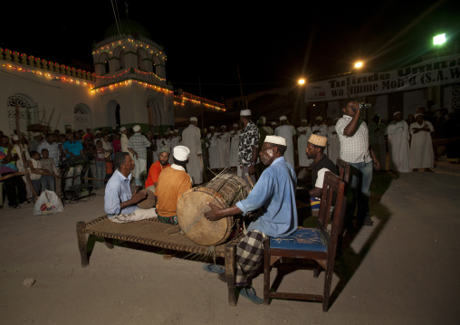 Muslim musicians in front of the mosque during Maulid festival, Lamu County, Lamu, Kenya