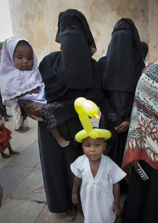 Muslim women with chidren during Maulid festival, Lamu County, Lamu, Kenya