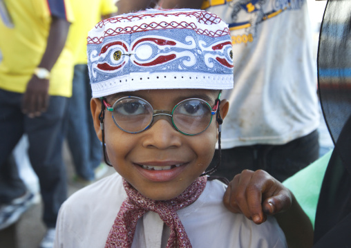 Young muslim boy during Maulid festival, Lamu County, Lamu, Kenya