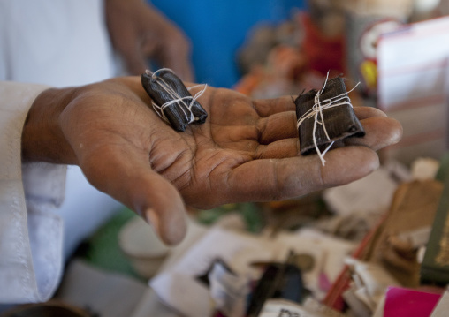 Little magic artefacts in the hand of witch doctor, Lamu County, Lamu, Kenya