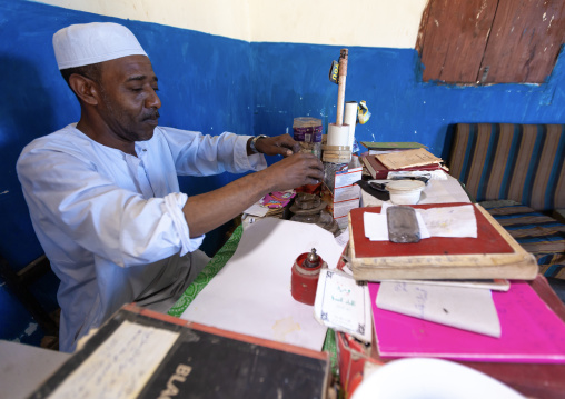 Kenyan witch doctor practicing black magic in his house, Lamu County, Lamu, Kenya