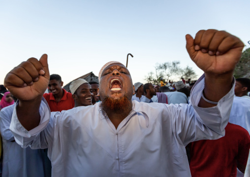 Muslim men celebrating the Maulid festival, Lamu County, Lamu, Kenya