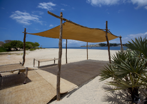 Sun umbrella on the beach, Lamu County, Manda Island, Kenya