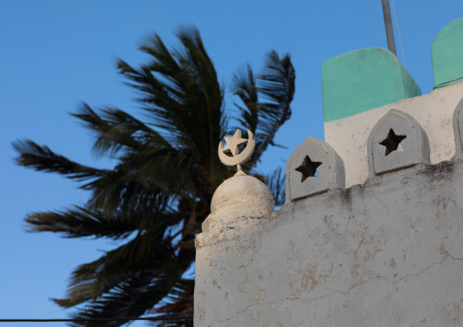 Star and moon on the roof of a mosque, Lamu county, Lamu town, Kenya