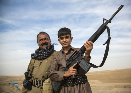 Kurdish General And His Son On The Frontline, Kirkuk, Kurdistan, Iraq