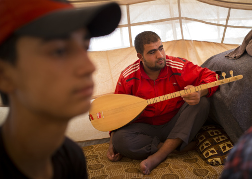 Syrian Refugee Playing Saz, Erbil, Kurdistan, Iraq