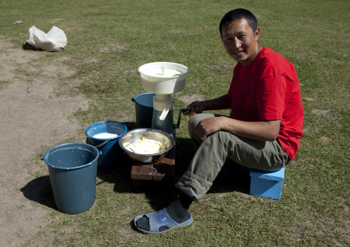 Man Making Butter From Horse Milk, Jaman Echki Village, Song Kol Lake Area, Kyrgyzstan