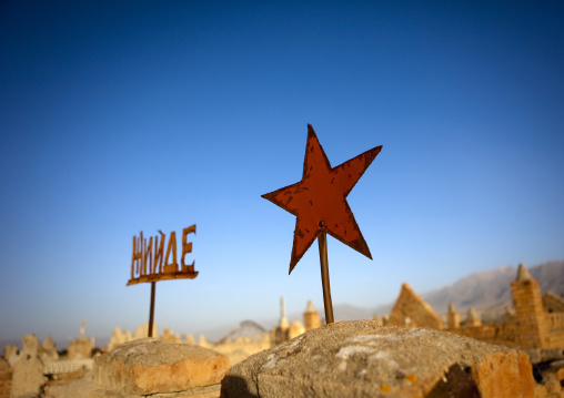 Rusty Red Star Sign On A Grave Of A Cemetery In Kochkor Area, Kyrgyzstan