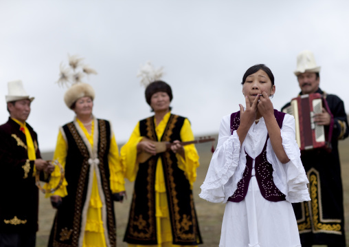 Men And Women Wearing Traditional Clothes And Hats, Saralasaz Jailoo, Kyrgyzstan