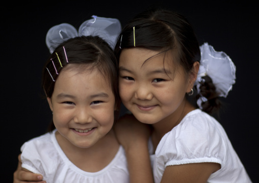 Two Cute Smiling Young Girls, Bishkek, Kyrgyzstan