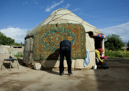 Couple Preparing Their Yurt For Funerals, Kochkor, Kyrgyzstan