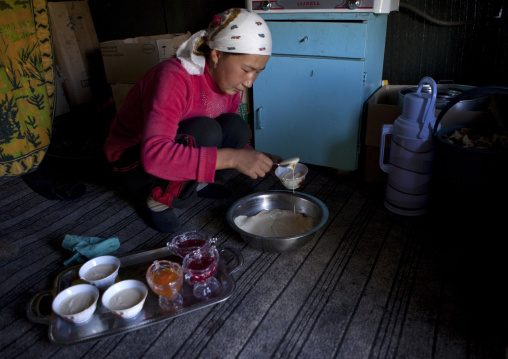 Woman Preparing The Meal Inside Her Yurt, Jaman Echki Jailoo Village, Kyrgyzstan