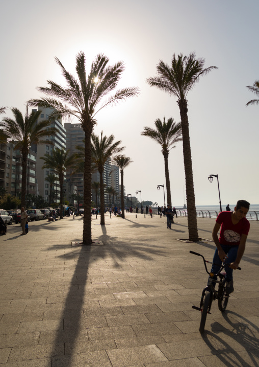 Lebanese man on a bicycle in the corniche, Beirut Governorate, Beirut, Lebanon