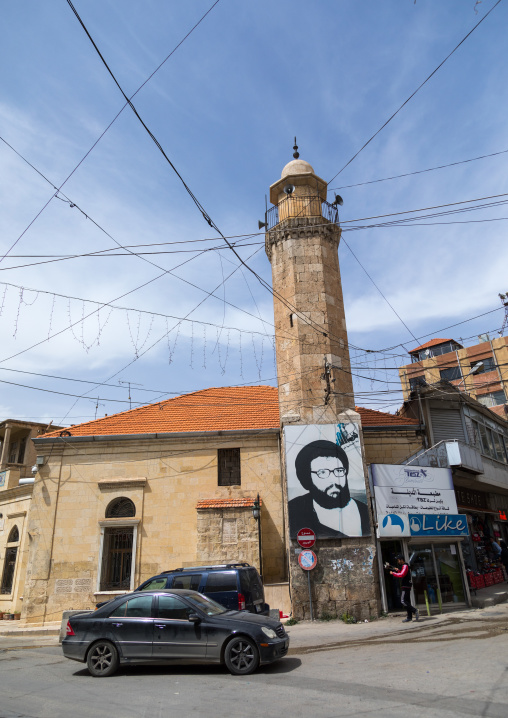 Mosque with the giant portrait of abbas al-musawi an hezbollah martyred leader, Beqaa Governorate, Baalbek, Lebanon