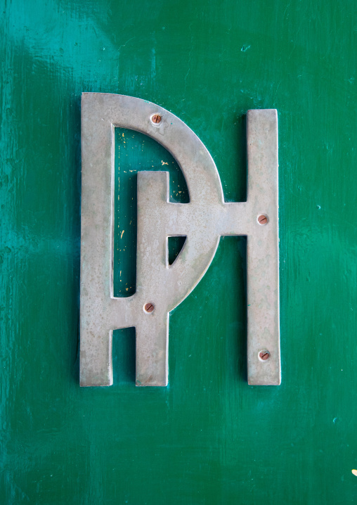 Palmyra hotel logo on the green entrance door, Beqaa Governorate, Baalbek, Lebanon