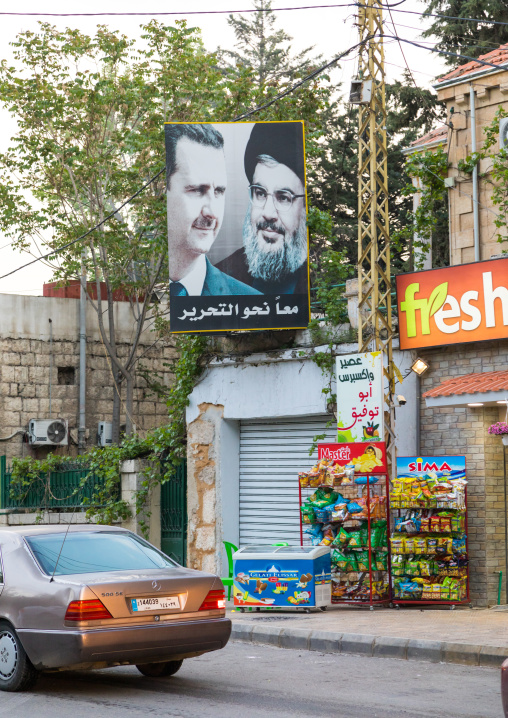 Bashar Al-Assad and Hassan Nasrallah portraits in the street, Beqaa Governorate, Baalbek, Lebanon