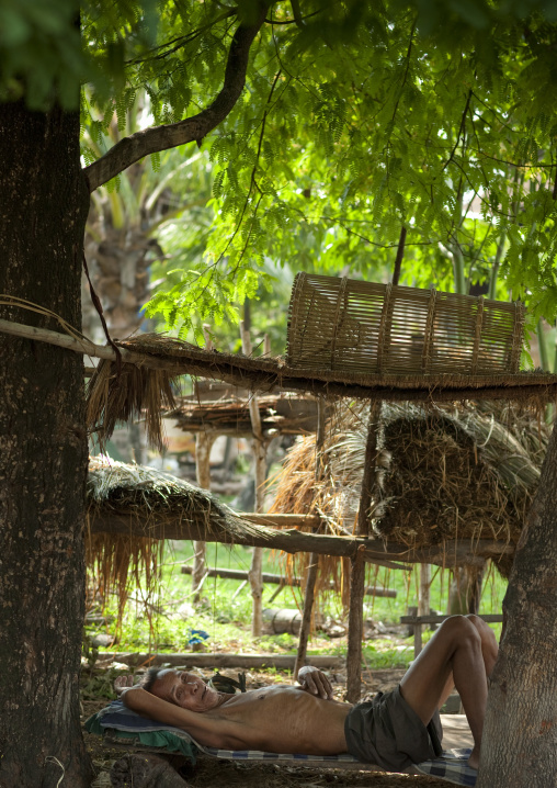 Bru minority old man resting, Phonsaad, Laos