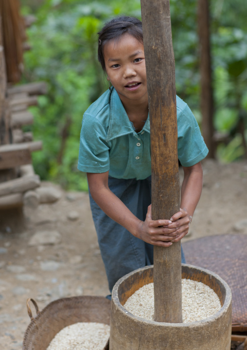 Khmu minority woman with pestle, Xieng khouang, Laos