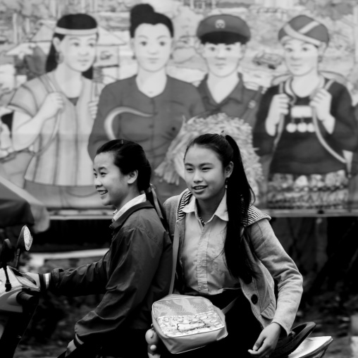 Khmu minority teenagers on a motorbike, Xieng khouang, Laos