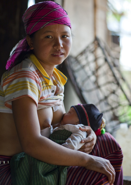 Akha minority breastfeeding woman, Muang sing, Laos