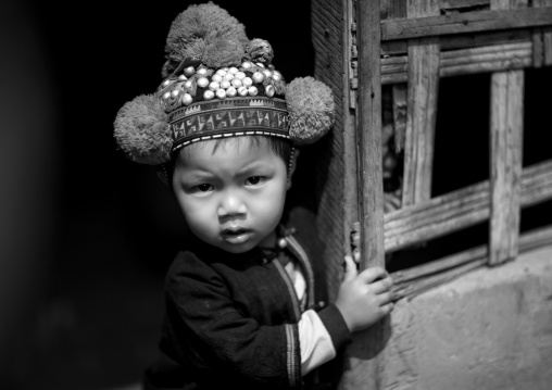 Yao minority kid with a traditional hat, Ban xay leck, Laos