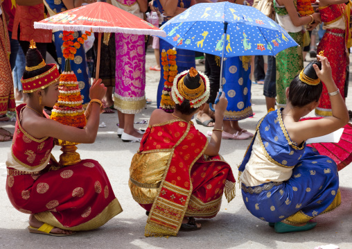Girl sin traditional clothing during pii mai lao new year celebration, Luang prabang, Laos
