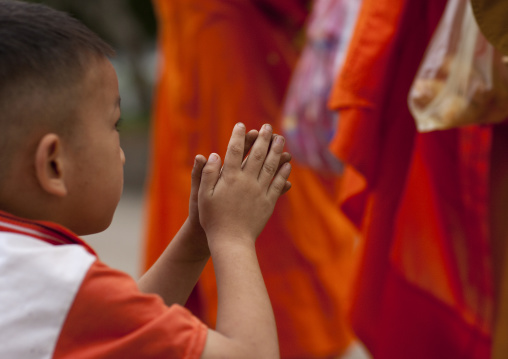 Lao buddhist monks collecting alms in luang prabang, Laos