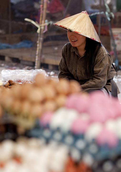 Eggs seller in a market, Vientiane, Laos