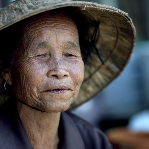 Old woman with conical hat, Vientiane, Laos